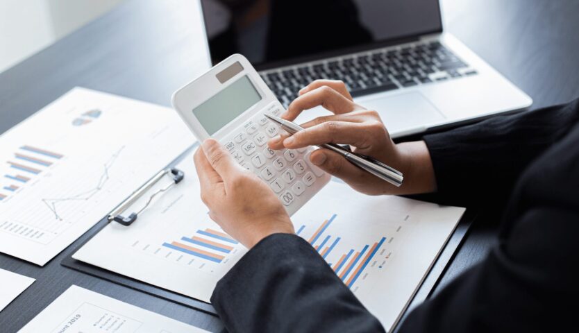 New business owner calculating corporate tax planning steps